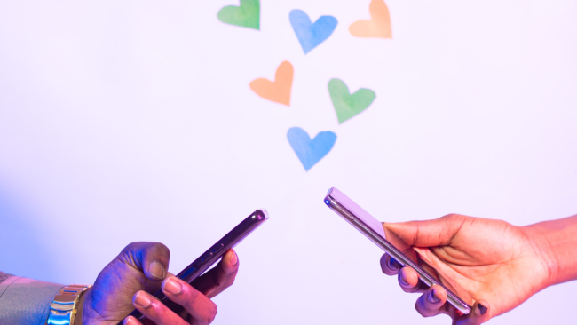 two people on their cell phones