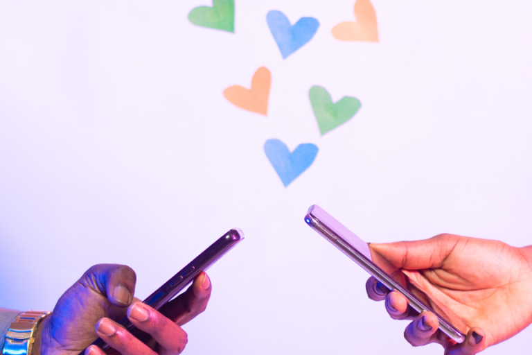 two people on their cell phones