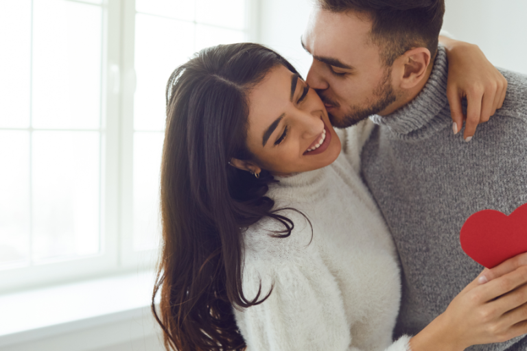 couple in love holding heart