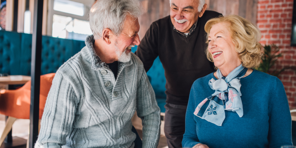 mature couple laughing at restaurant