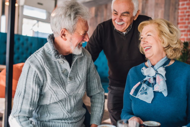 mature couple laughing at restaurant