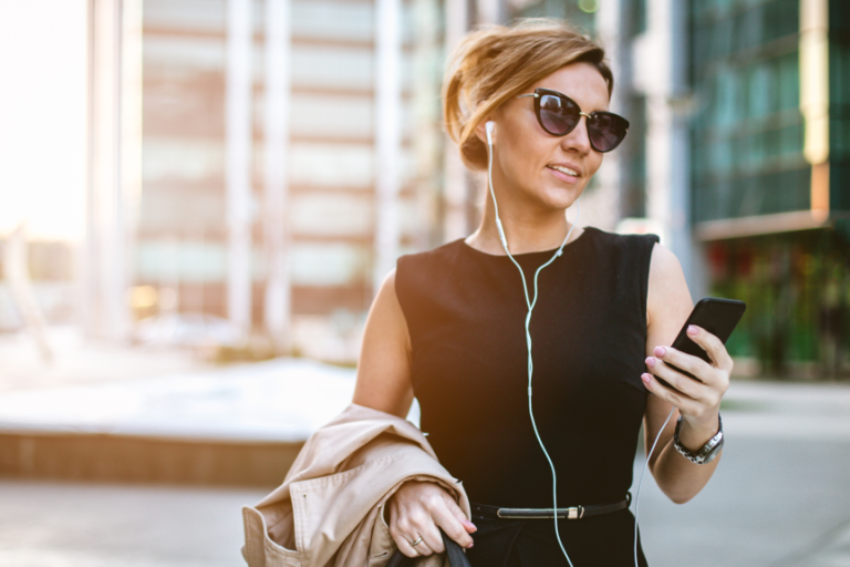 professional woman looking at her cell phone