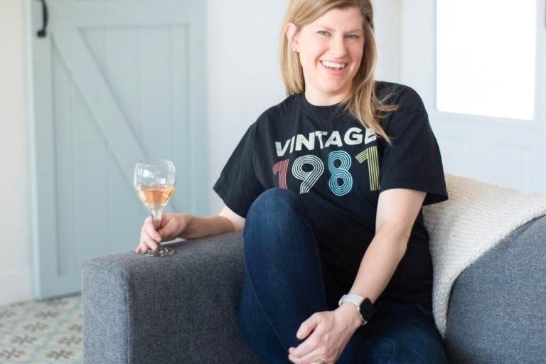 rebecca cooper traynor sitting on couch