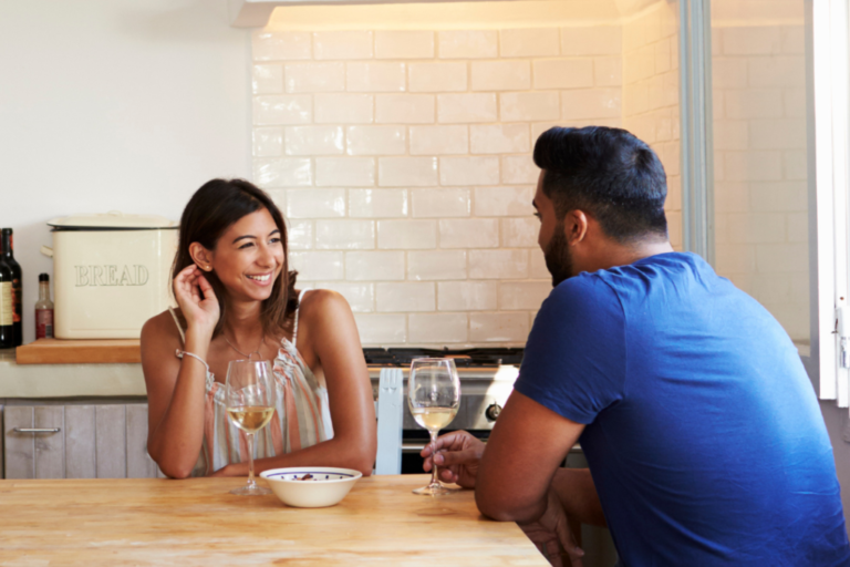 couple chatting in the kitchen