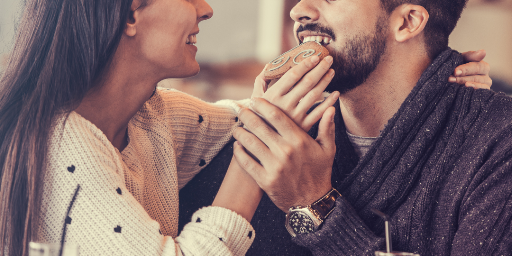 couple on a date eating a cookie