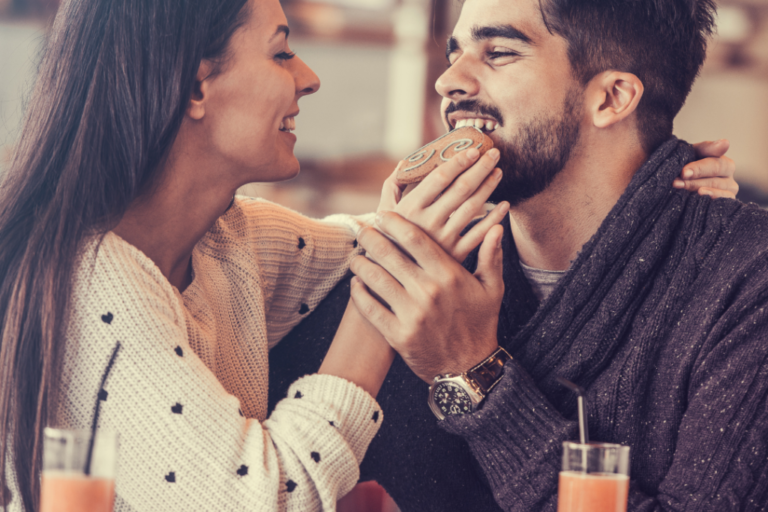 couple on a date eating a cookie