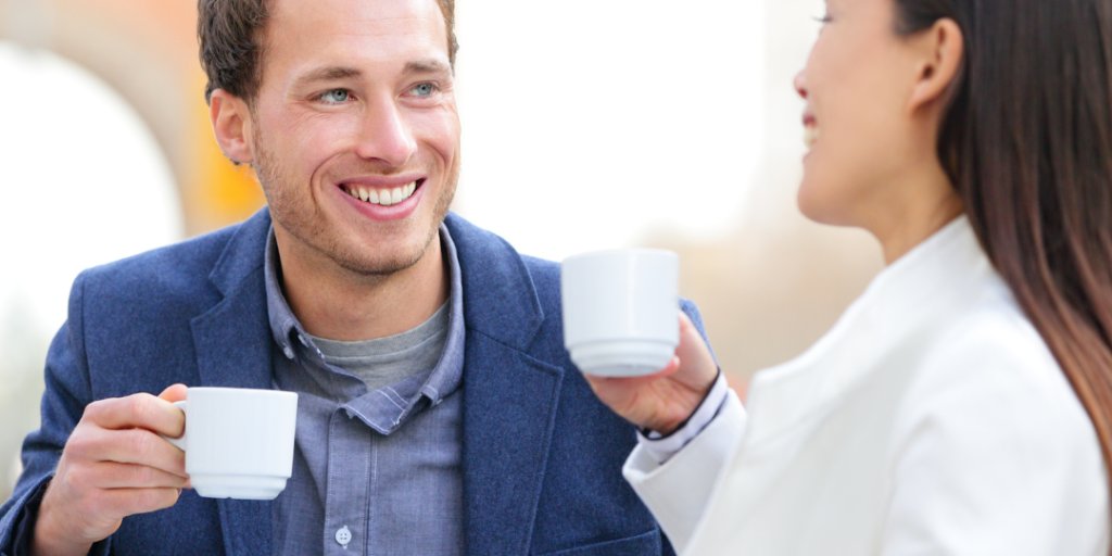 man and woman drinking coffee