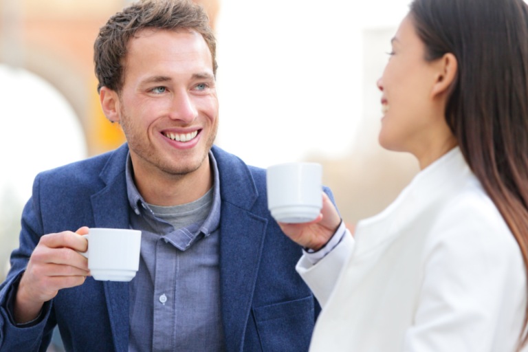 man and woman drinking coffee