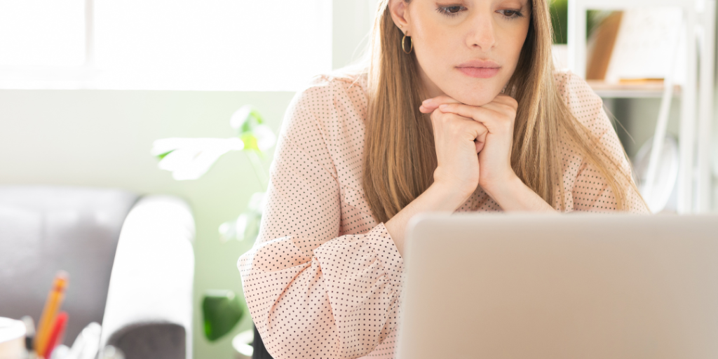 women staring at her computer screen