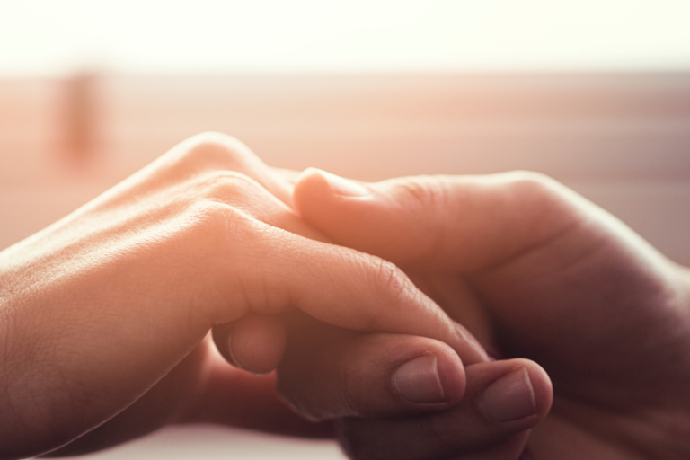 couple holding hands