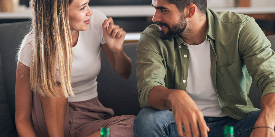 couple talking on the couch